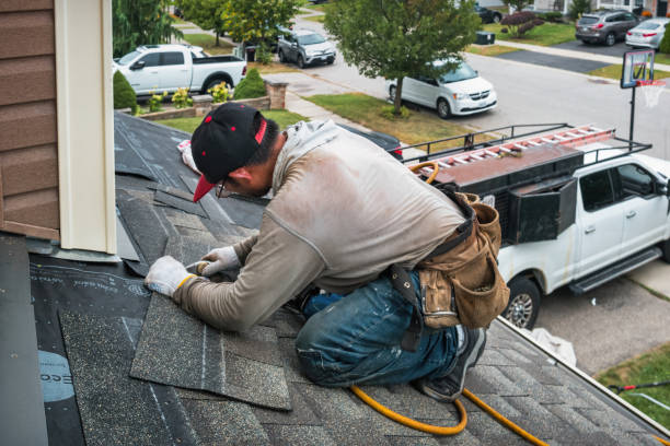 Professional Roofing technician working in New Durham, NH